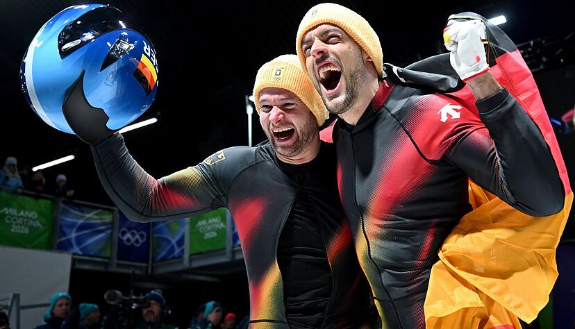 Feiern ausgelassen an der Bobbahn von Cortina: Pilot Johannes Lochner (links) und sein Anschieber Georg Fleischhauer. Feiern ausgelassen an der Bobbahn von Cortina: Pilot Johannes Lochner (links) und sein Anschieber Georg Fleischhauer.