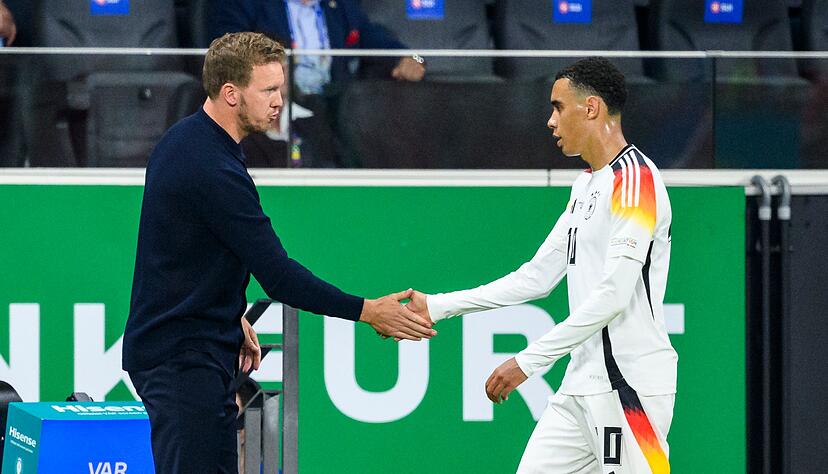 Zur WM wieder vereint? Bundestrainer Julian Nagelsmann und Jamal Musiala. (Archivbild)