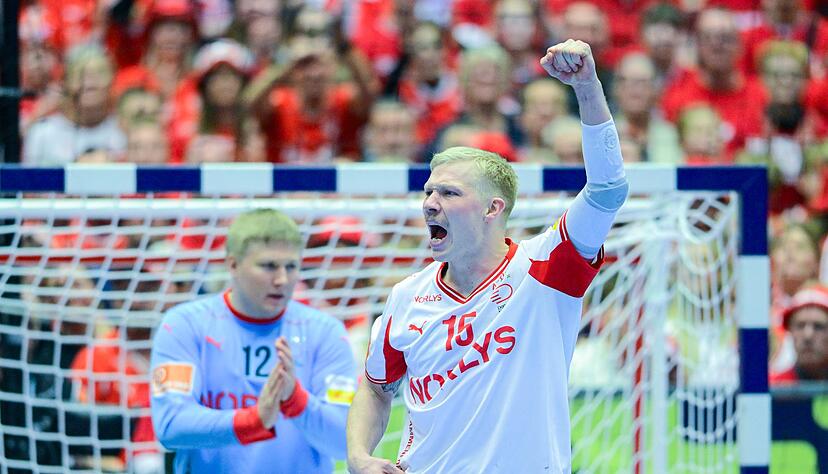 Dänemarks Kapitän Magnus Saugstrup feiert den Sieg über Dänemark. Dänemarks Kapitän Magnus Saugstrup feiert den Sieg über Dänemark.