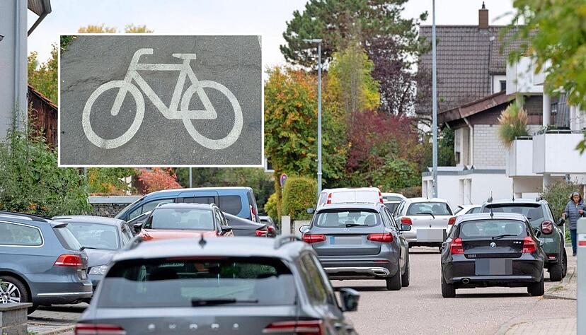 Parkende Autos und sich an ihnen vorbeischlängelnde Pkw. Wo ist da noch Platz für sicheres Radfahren? Die Kümmelstraße in Sülzbach soll zur Fahrradstraße werden. Parkende Autos und sich an ihnen vorbeischlängelnde Pkw. Wo ist da noch Platz für sicheres Radfahren? Die Kümmelstraße in Sülzbach soll zur Fahrradstraße werden.