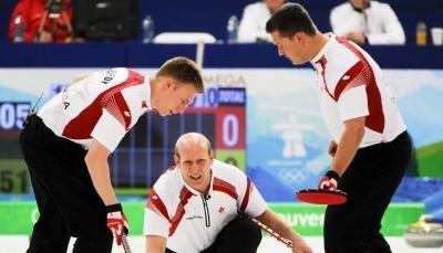 Kanadas Skip Kevin Martin (m) ist so etwas wie der Nationalheilige des Curlings.