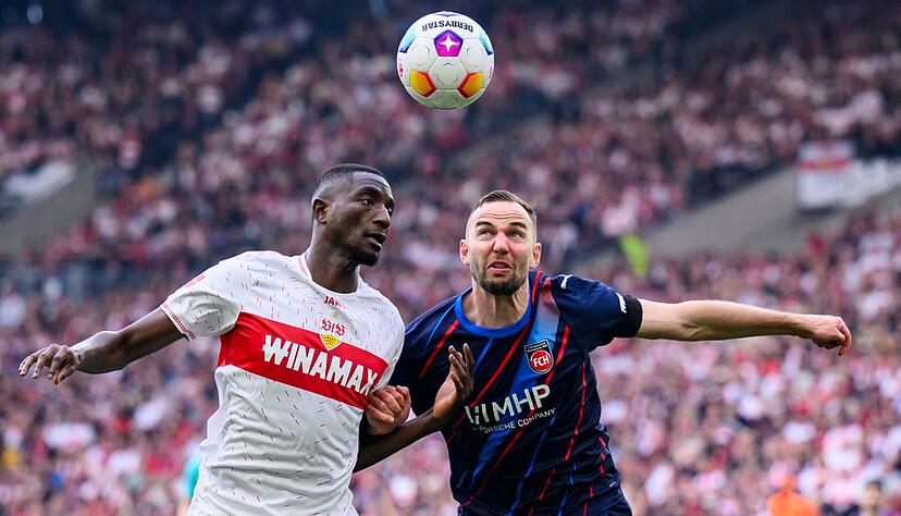 Benedikt Gimber (r) und der 1. FC Heidenheim nehmen einen Punkt aus Stuttgart mit. Benedikt Gimber (r) und der 1. FC Heidenheim nehmen einen Punkt aus Stuttgart mit.