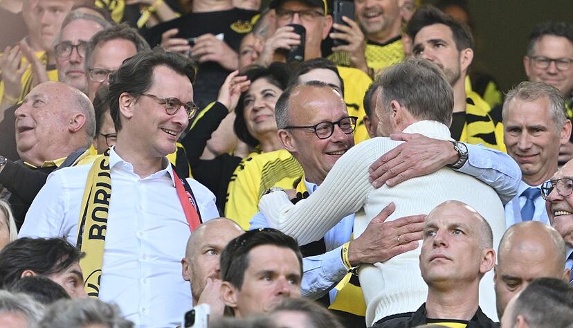 Partei- und BVB-Freunde: Friedrich Merz (Mitte) und Hans-Joachim Watzke (Archivfoto).
