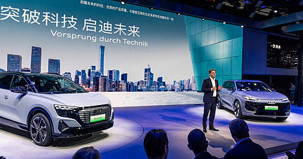 At Auto China Audi showcases its strategy and all-electric portfolio for the world’s largest automotive market: Audi CEO Gernot Döllner with Audi Q5 e-tron RS edition and Audi Q6L e-tron
