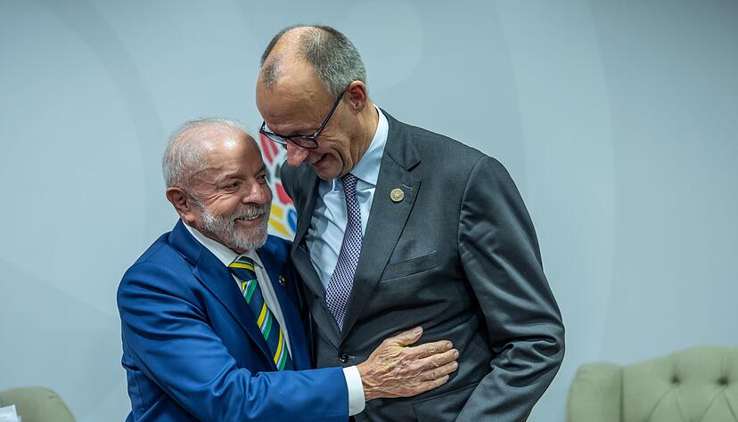 Das sieht schon fast so aus, als w&uuml;rden Merz und Lula miteinander tanzen.