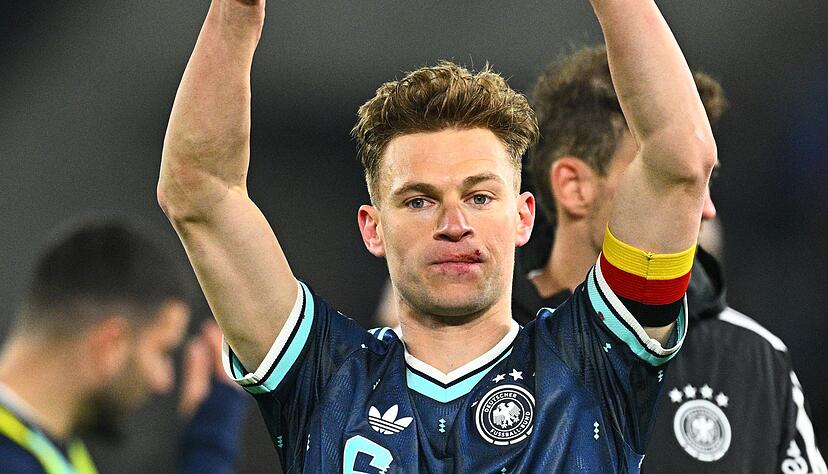 Joshua Kimmich feiert mit einer Verletzung an der Lippe den Sieg in der Schweiz. Joshua Kimmich feiert mit einer Verletzung an der Lippe den Sieg in der Schweiz.