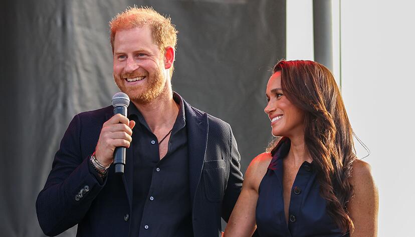Prinz Harry und Herzogin Meghan packen in einer Gemeinschaftsküche mit an. (Archivbild)
