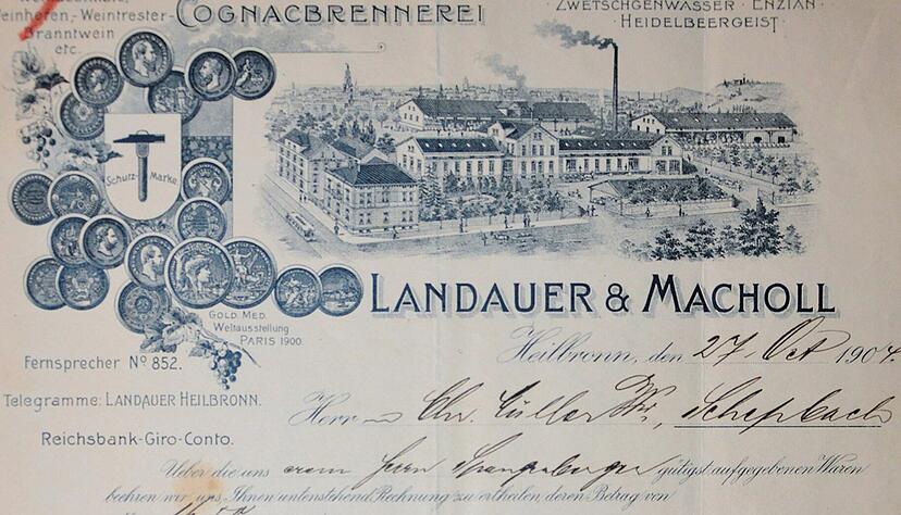 Max Landauer gr&uuml;ndet 1861 an der S&uuml;lmerstra&szlig;e 101 eine Firma, die laut Ratsbeschluss nur &bdquo;feine Spirituosen&ldquo; produzieren darf. Nach dem Einstieg von Leopold Macholl firmiert man unter Landauer & Macholl Branntwein-Brennerei und Lik&ouml;rfabrik Heilbronn. 1876 ist die Firma an die Karlstra&szlig;e umgesiedelt.
