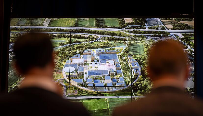 Ein Gewinnerentwurf vom Architekturbüro MVRDV für einen KI-Park ist auf einem Monitor zu sehen.