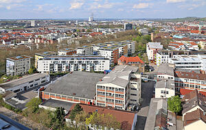 Die bunten Häuser bilden heute die Neckarterrassen - früher standen dort die Brauerei-Gebäude. Foto: Archiv/Sawatzki Die bunten Häuser bilden heute die Neckarterrassen - früher standen dort die Brauerei-Gebäude. Foto: Archiv/Sawatzki