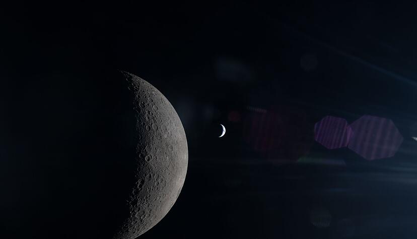 Die Crew hat den Mond intensiv beobachtet. Dahinter ist die Erde zun sehen.