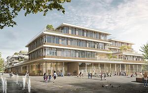 Glas, Holz und einzelne Bäume dominieren die terrassenförmige Fassade der neuen Schule. Besonders innovativ ist die Idee, den Schulhof als verbindendes Element der drei Gebäudeteile umlaufend in die erste Etage zu verlegen.
Foto: privat
