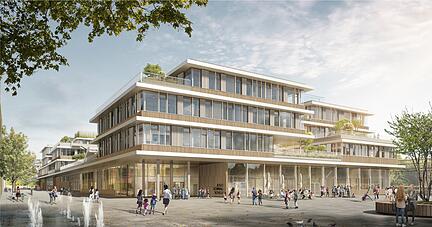 Glas, Holz und einzelne Bäume dominieren die terrassenförmige Fassade der neuen Schule. Besonders innovativ ist die Idee, den Schulhof als verbindendes Element der drei Gebäudeteile umlaufend in die erste Etage zu verlegen.
Foto: privat