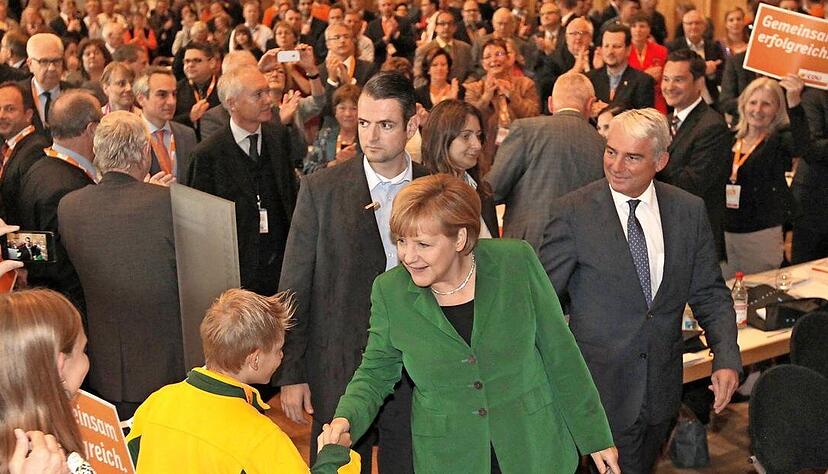 2013 besucht Bundeskanzlerin Angela Merkel den CDU-Landesparteitag in der Harmonie in Heilbronn. Rechts daneben: CDU-Landeschef Thomas Strobl.