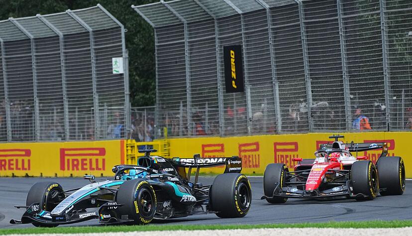 George Russell (l) und Charles Leclerc duellieren sich hart. George Russell (l) und Charles Leclerc duellieren sich hart.