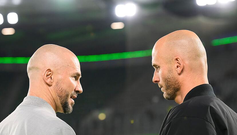 Hoffenheims Trainer Christian Ilzer (l) und sein Wolfsburger Kollege Paul Simonis.