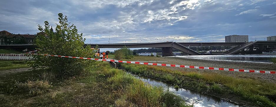 Das zu DDR-Zeiten errichtete Beton-Bauwerk ist eine von fünf für Fahrzeuge und Straßenbahn nutzbaren Nord-Süd-Verbindungen über den Fluss im Gebiet der Landeshauptstadt.