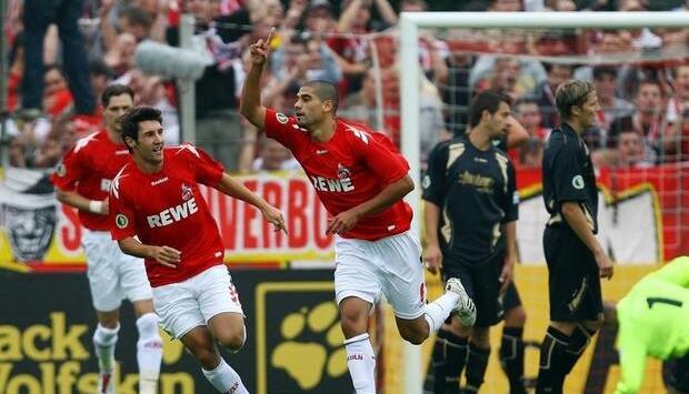 Kölns Taner Yalcin (M) jubelt nach seinem Treffer zum 1:0 mit Stephan Salger (l). Kölns Taner Yalcin (M) jubelt nach seinem Treffer zum 1:0 mit Stephan Salger (l).