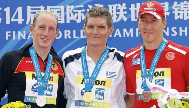 Lurz, Gianniotis und der Dritte Sergej Bolschakow (v.l.) bei der Siegerehrung.