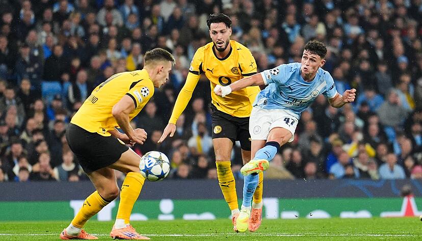 Foden (rechts) bekam für seine Leistung gegen Dortmund international viel Anerkennung. Foden (rechts) bekam für seine Leistung gegen Dortmund international viel Anerkennung.