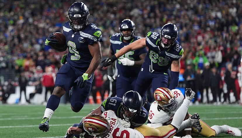 Drei Touchdowns für Kenneth Walker III (9). Drei Touchdowns für Kenneth Walker III (9).