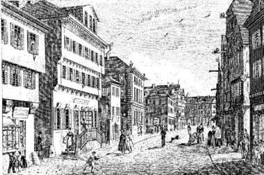 Alte Fleiner Straße 1936: Blick vom Kiliansplatz nach Süden. Vorn rechts Einmündung der Eichgasse, links gegenüber das Handelshaus Rund (2. Haus von links). Im Hintergrund die Messerfabrik Dittmar (heute Galeria Kaufhof).