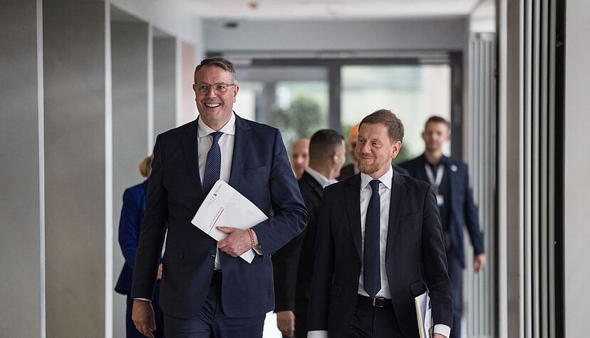 Der Vorsitzende der Ministerpräsidentenkonferenz Alexander Schweitzer (SPD) und sein Vize, Michael Kretschmer (CDU) sehen sich als «Möglichmacher». Der Vorsitzende der Ministerpräsidentenkonferenz Alexander Schweitzer (SPD) und sein Vize, Michael Kretschmer (CDU) sehen sich als «Möglichmacher».