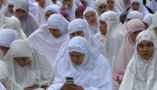 Frauen feiern in Banda Aceh das muslimische Opferfest. Foto: Hotli Simanjuntak