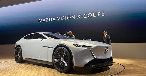 Der Vision X-Coupé setzt auf ein Plug-in-Hybridsystem mit einem Zweischeiben-Wankelmotor. Der Vision X-Coupé setzt auf ein Plug-in-Hybridsystem mit einem Zweischeiben-Wankelmotor.