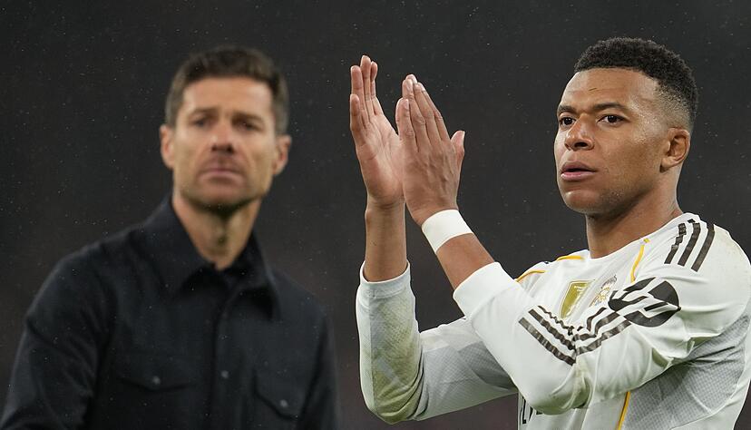 Kylian Mbapp&eacute; (r) hat sich mit Respekt von seinem bisherigen Trainer Xabi Alonso verabschiedet. (Archivbild)
