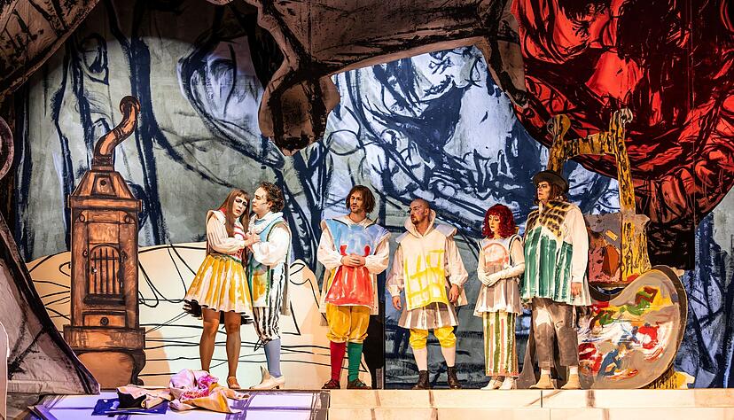 Das tragische Liebespaar Mim&igrave; und Rudolfo (Lubov Karetnikova und Garrett Evers, links) samt K&uuml;nstlerclique in der Boh&egrave;me-Kulisse von Maler Markus L&uuml;pertz.