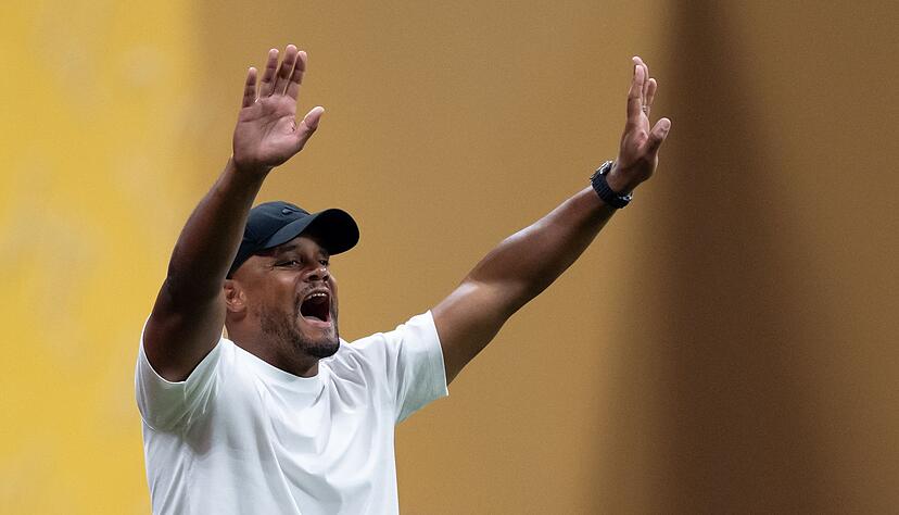 Vincent Kompany am Spielfeldrand in Aktion.