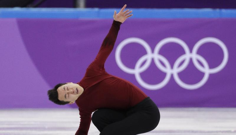Der Kanadier Patrick Chan bei seiner K&uuml;r auf dem Eis. Foto: David J. Phillip