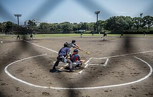 Japanische Baseballer auf einem Trainingsgelände. Foto: dpa Japanische Baseballer auf einem Trainingsgelände. Foto: dpa
