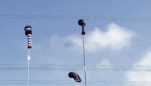 Nein, das sind keine Antennen − sondern die längsten Golfschläger der Welt. Nein, das sind keine Antennen − sondern die längsten Golfschläger der Welt.