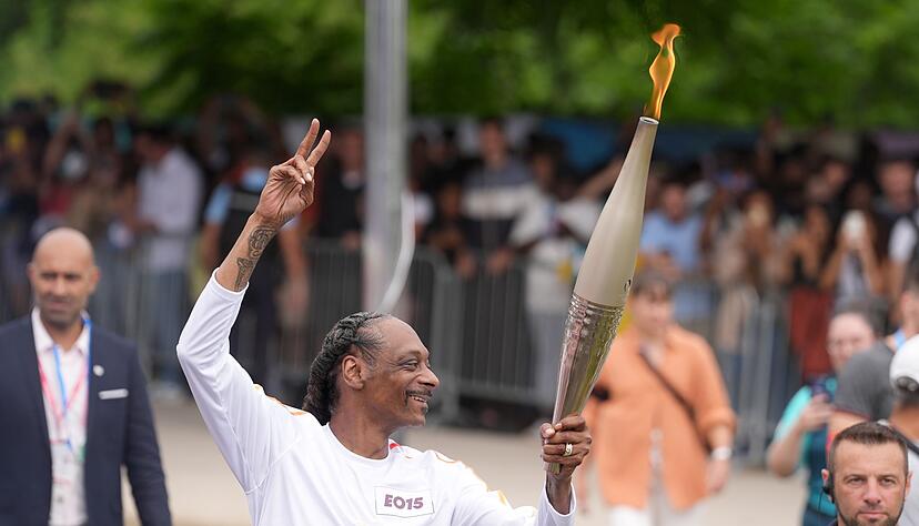 Auch  beim Fackellauf in Paris war Snoop Dogg