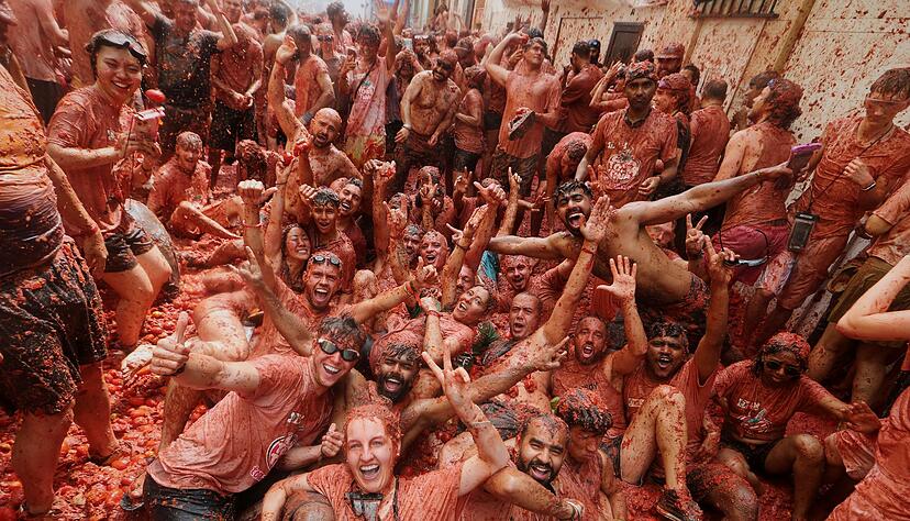 La &laquo;Tomatina&raquo; gilt als die gr&ouml;&szlig;te Lebensmittelschlacht der Welt.