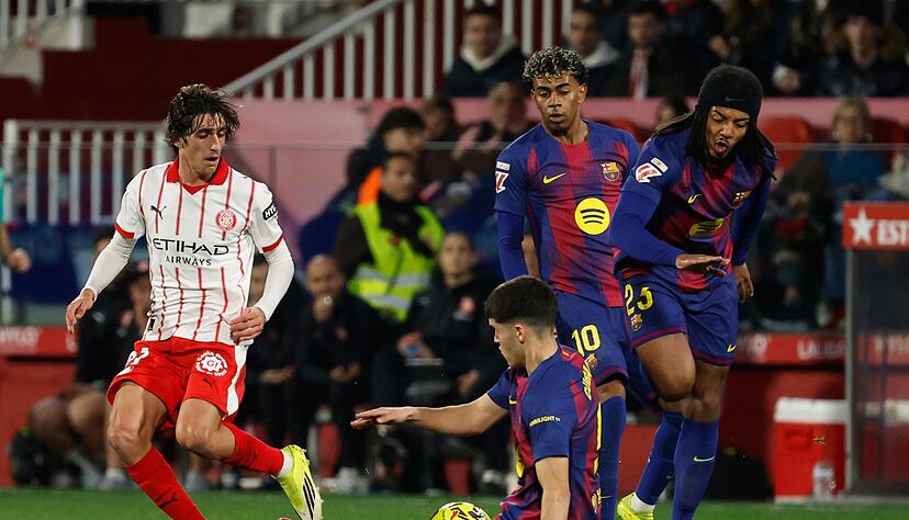 Die Spieler des FC Barcelona (rechts) erwischten in Girona keinen guten Tag. Die Spieler des FC Barcelona (rechts) erwischten in Girona keinen guten Tag.