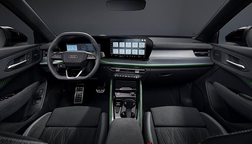 Der Fahrer blickt auf ein 11,9 Zoll großes Kombiinstrument, das fließend in einen gewölbten 12,8-Zoll-Touchscreen übergeht.