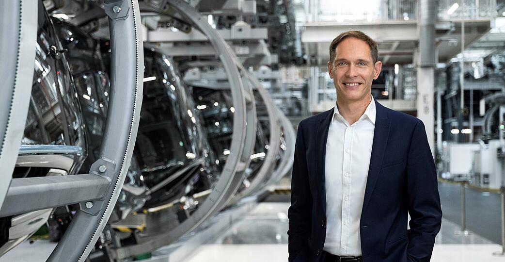 Audi-Produktionsvorstand Gerd Walker sieht den Standort Neckarsulm gut aufgestellt f&uuml;r ein volumenstarkes E-Auto.