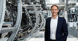 Audi-Produktionsvorstand Gerd Walker sieht den Standort Neckarsulm gut aufgestellt f&uuml;r ein volumenstarkes E-Auto.