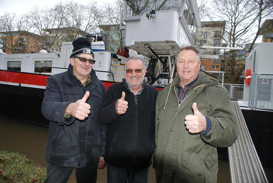 Sie steuerten die MS Experimenta sicher nach Heilbronn: Die beauftragten Kapitäne Wolfgang Ernst (Mitte), Jürgen Wäsch und Theo Wäsch. Foto: Friese