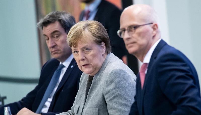 Coronavirus-Pk mit Markus Söder (l-r), Angela Merkel, Peter Tschentscher und Olaf Scholz (nicht im Bild) im Bundeskanzleramt.