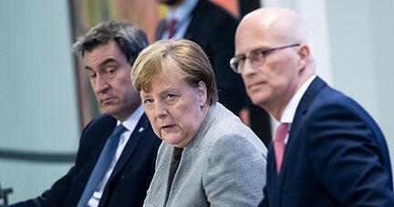 Coronavirus-Pk mit Markus Söder (l-r), Angela Merkel, Peter Tschentscher und Olaf Scholz (nicht im Bild) im Bundeskanzleramt.