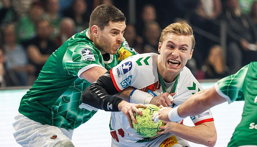 Mijajlo Marsenic (l.) und Magdeburgs Gisli Kristjansson im Duell um den Ball. (Archivbild) Mijajlo Marsenic (l.) und Magdeburgs Gisli Kristjansson im Duell um den Ball. (Archivbild)