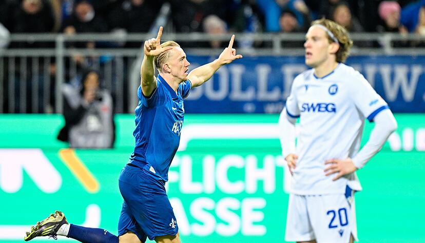 Darmstadts Isac Lidberg jubelt über sein Tor zum zwischenzeitlichen 2:1 gegen Karlsruhe. Darmstadts Isac Lidberg jubelt über sein Tor zum zwischenzeitlichen 2:1 gegen Karlsruhe.