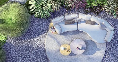Wie aus einem Guss: Das Outdoorsofa von Zebra fügt sich mit dem Teppich und den beiden Tischen elegant als Einheit zusammen.