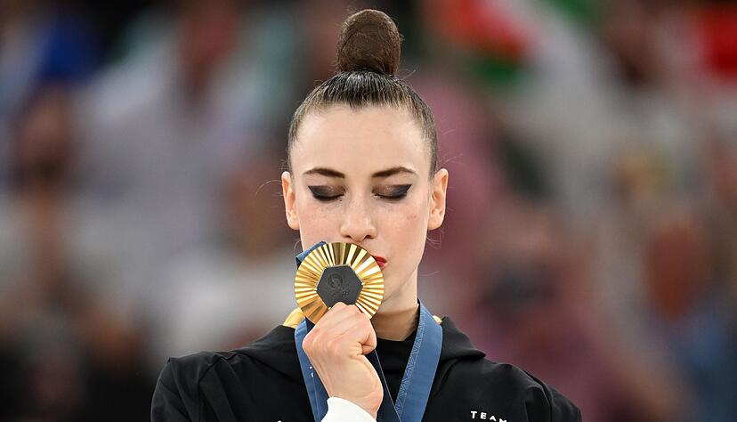 Ein Kuss für Gold: Gymnastinnen hoffen auf mehr Popularität.