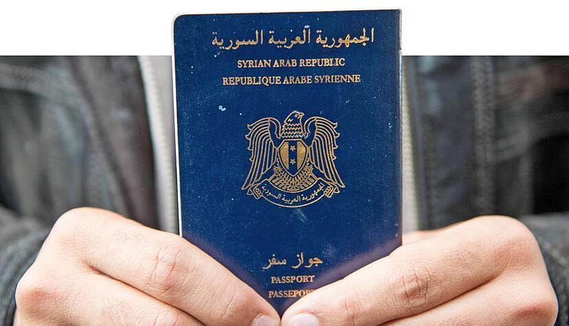 Syrische P&auml;sse sind unter Fl&uuml;chtlingen begehrt, auch andere Dokumente werden im Netz angeboten. Foto: Archiv/dpa