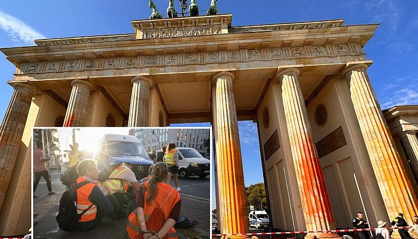 Aktivisten der Letzten Generation haben am Wochenende das Brandenburger Tor mit oranger Farbe aus Feuerl&ouml;schern bespr&uuml;ht.